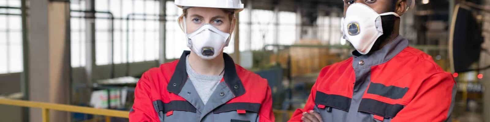 Industrial workers wearing respiratory protection