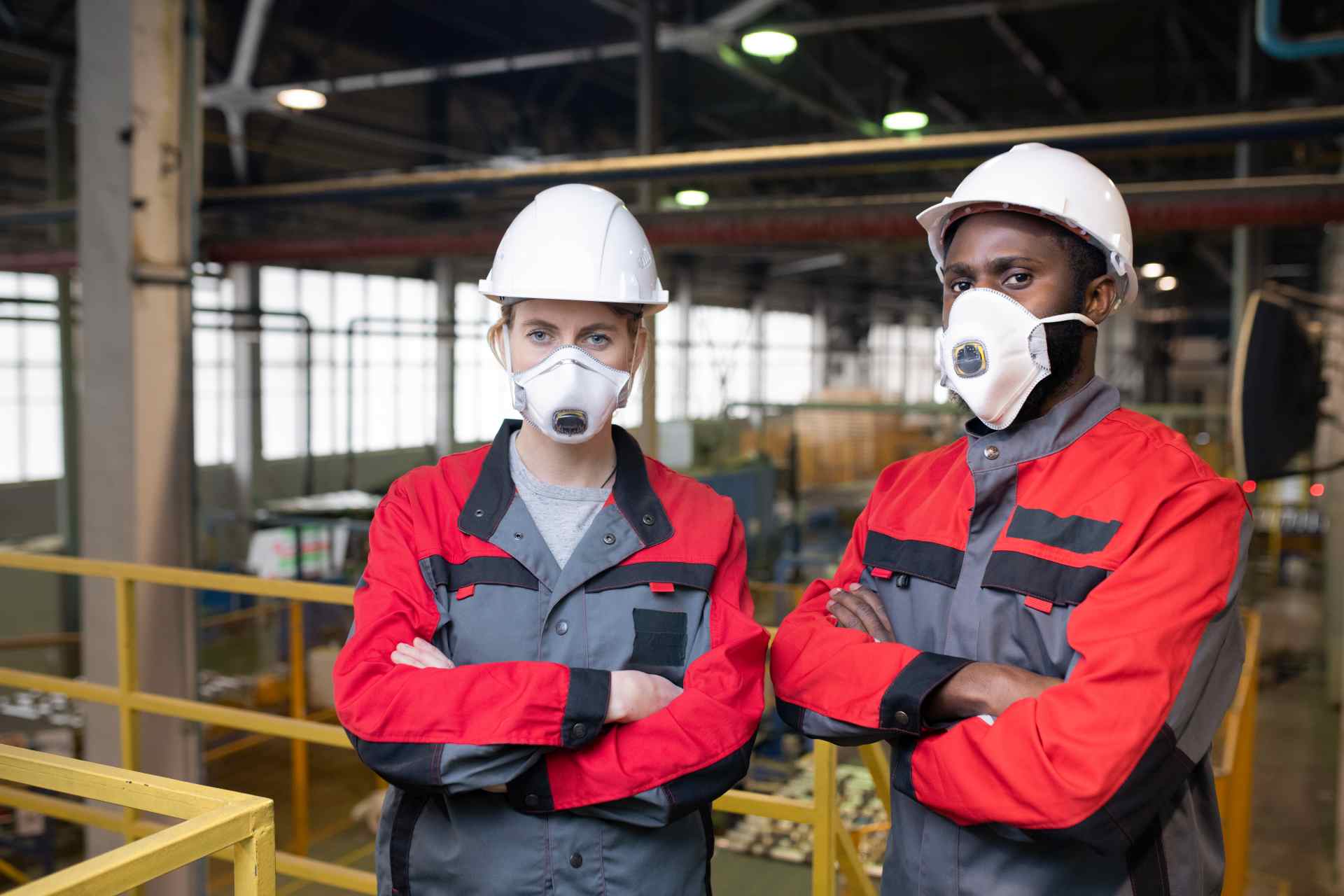 Industrial workers wearing respiratory protection