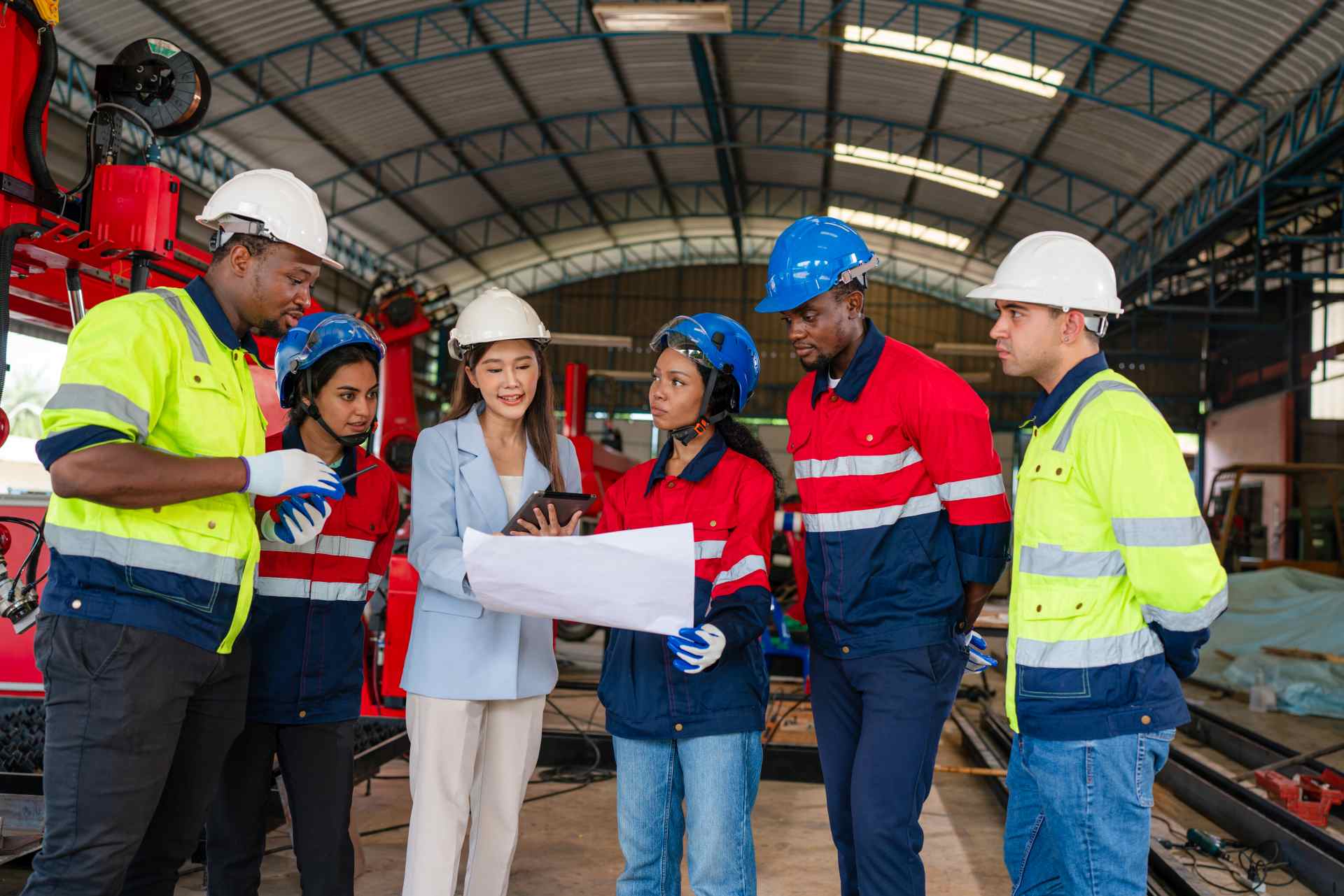 Industrial safety training session with diverse workforce.