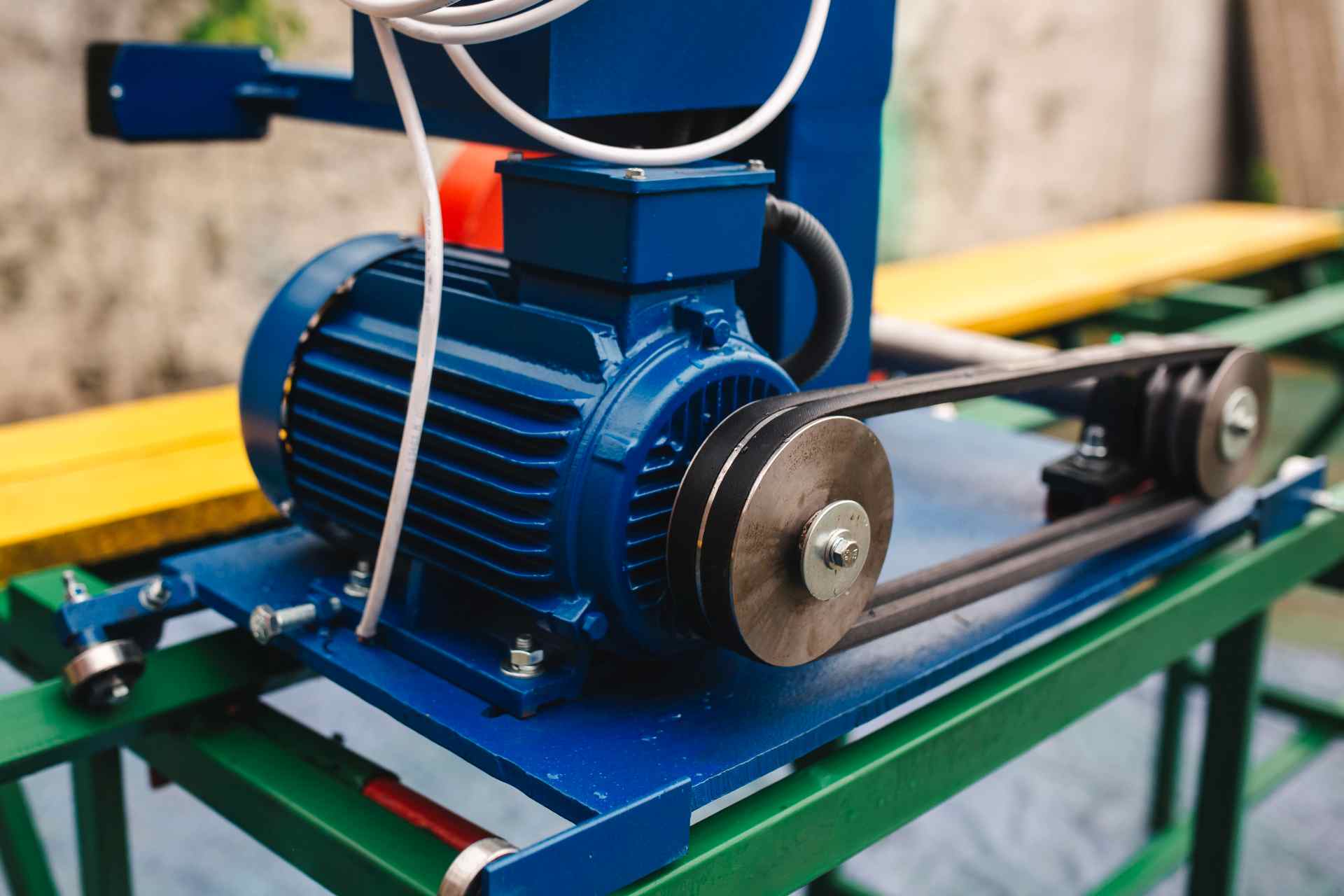 V-belts and pulleys on industrial electric motor